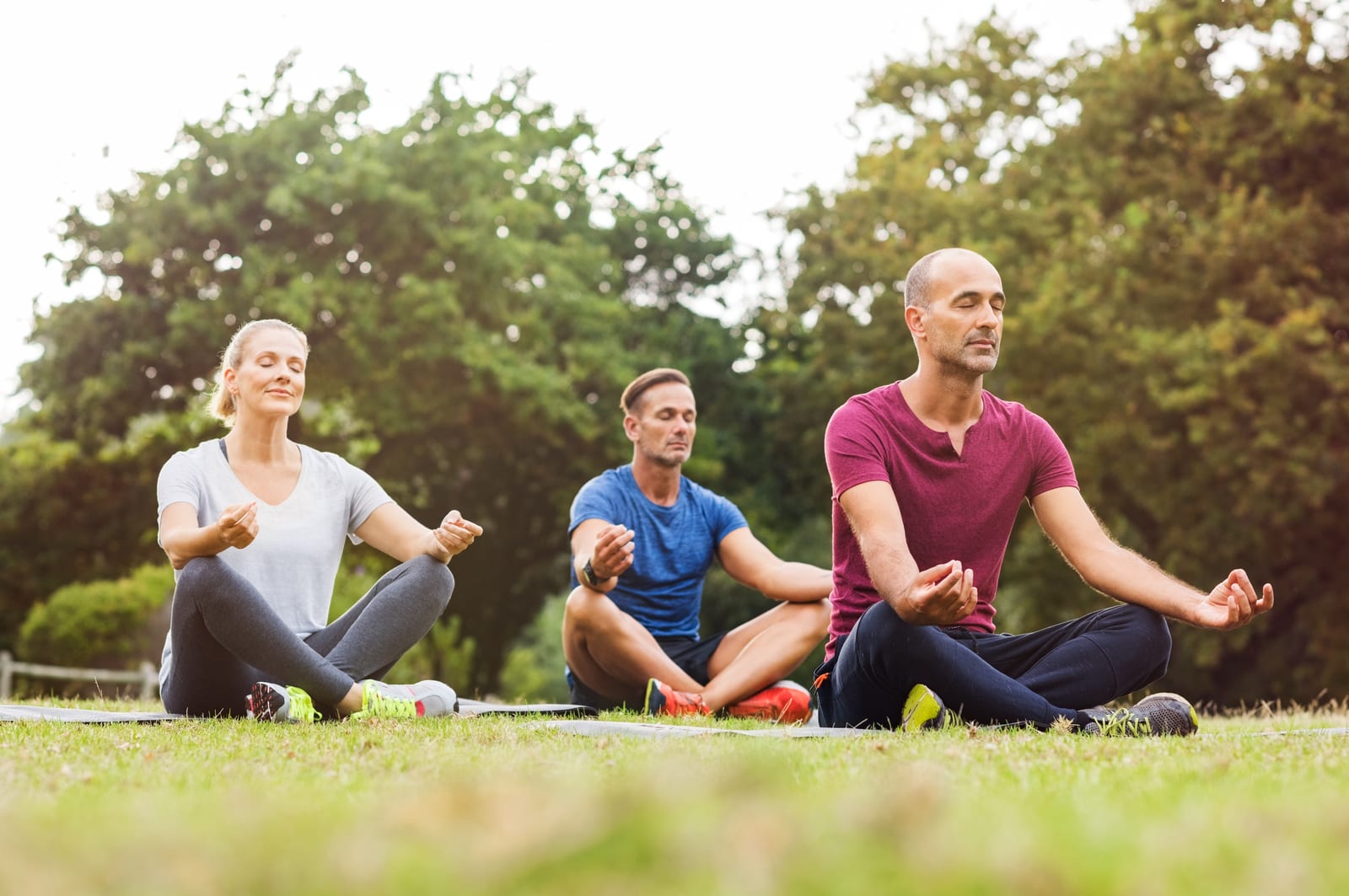 people doing yoga for knee pain